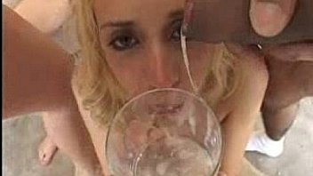 Kelly wells drinking glass of cum